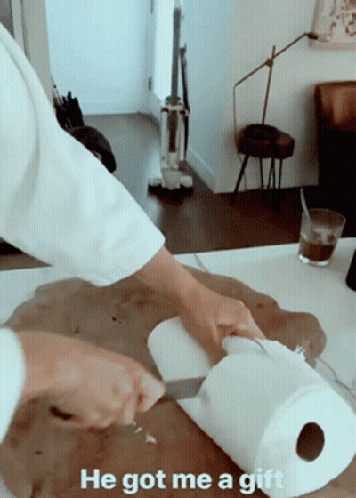 Person Cutting Paper Towels Saying He Got Me A Gift GIF