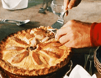 Person Cutting Pie With Fork And Knife GIF
