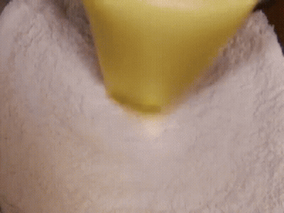 Person Cutting Quesadilla In Half GIF
