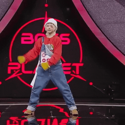 Person Dancing In Front Of Boys Planet Sign GIF