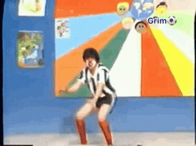 Person Dancing In Front Of Grim Wall GIF