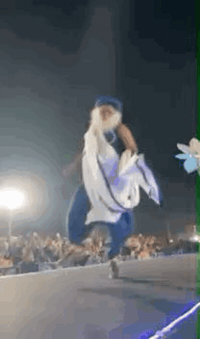 Person Dancing On Stage At Night GIF