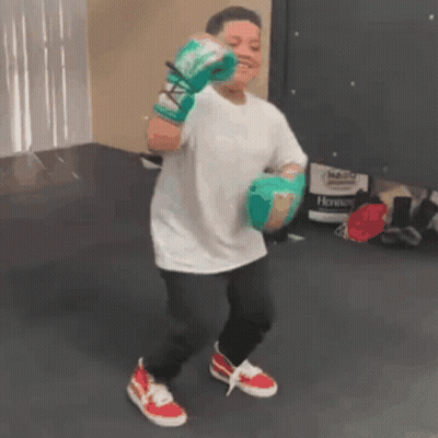 Person Dancing With Boxing Gloves GIF