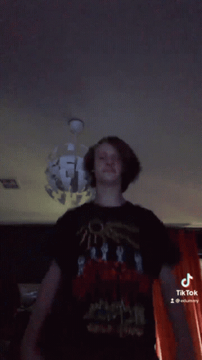 Person Dancing With Chandelier GIF