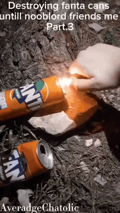 Person Destroying Fanta Cans With Lighter GIF