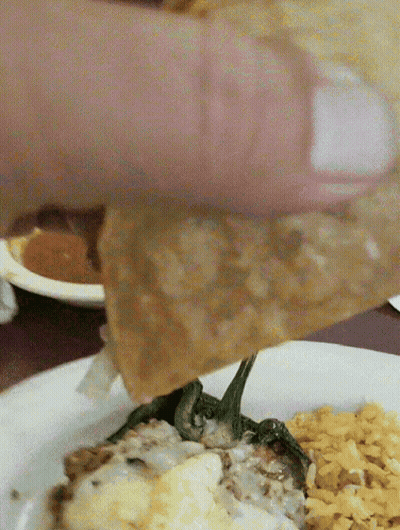 Person Dipping Food Into Plate GIF