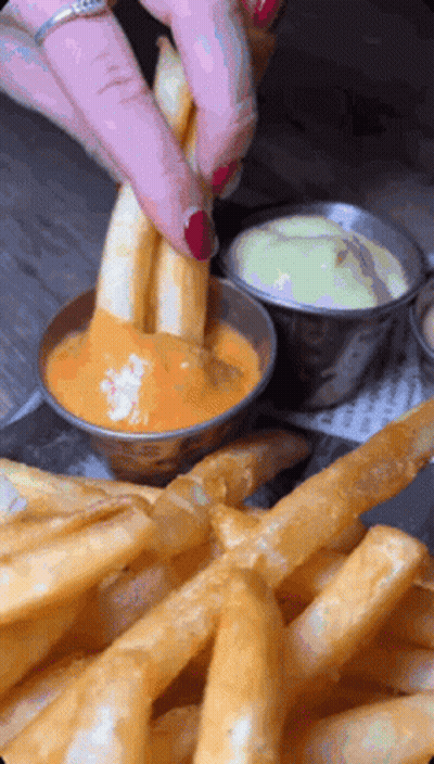 Person Dipping French Fries In Sauce GIF
