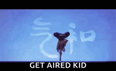 Person Doing Handstand In Front Of Blue Background With Chinese Writing GIF