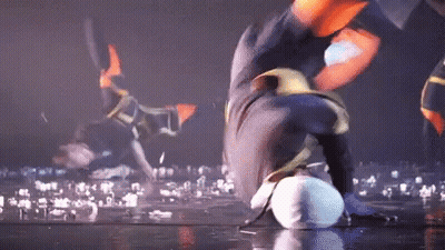Person Doing Handstand On Stage With Crowd GIF