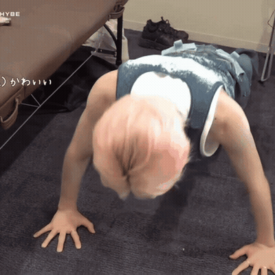 Person Doing Push Ups With HYBE Logo GIF
