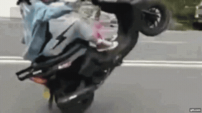 Person Doing Wheelie On Motorcycle GIF