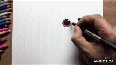 Person Drawing Cat Eye With Colored Pencils GIF