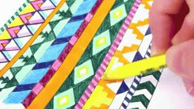 Person Drawing Colorful Geometric Pattern With Yellow Pencil GIF