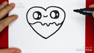 Person Drawing Heart With Face With Marker GIF