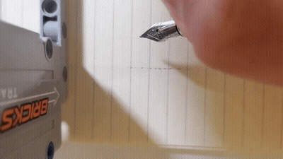 Person Drawing With Fountain Pen GIF