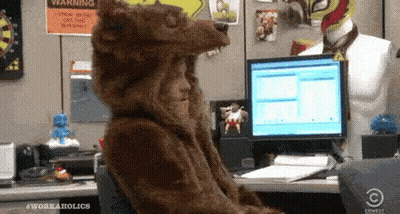 Person Dressed As Bear At Computer GIF
