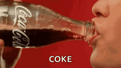 Person Drinking Bottle Of Coca Cola GIF