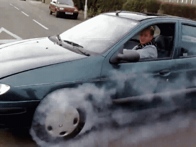 Person Driving Car With Smoke From Tire GIF