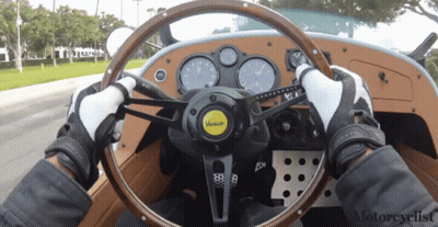 Person Driving Vehicle Saying Voyage GIF