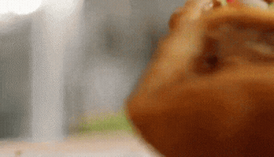 Person Eating Burger Close Up GIF