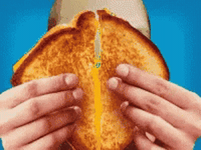 Person Eating Grilled Cheese Sandwich GIF