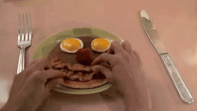 Person Eating Pancake Face With Eggs Bacon Strawberries GIF