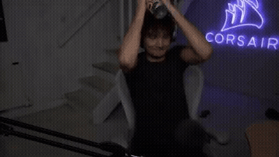 Person Exercising On Rowing Machine At Corsair Sign GIF