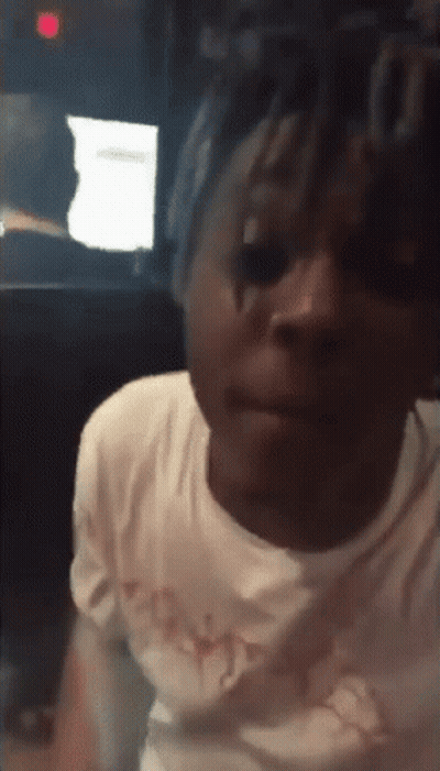 Person Face With Red Exit Sign GIF