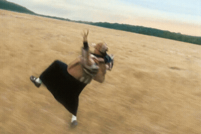 Person Falling Down Hill With Arms Outstretched GIF