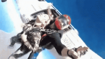 Person Falling From Plane With Helmet GIF