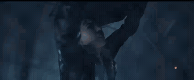 Person Flying With Sword In Dark Room GIF