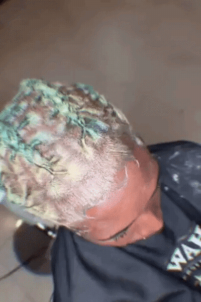 Person Getting Hair Dyed Green In Salon GIF