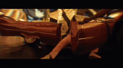 Person Getting Out Of Car With Legs Crossed GIF
