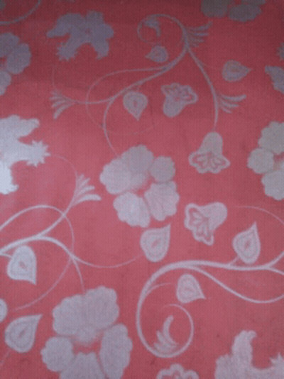Person Giving Thumbs Up On Pink Floral Background GIF