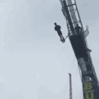 Person Hanging From Bungee Jumping Tower GIF