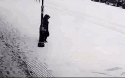 Person Hilariously Slipping On Ice While Walking GIF