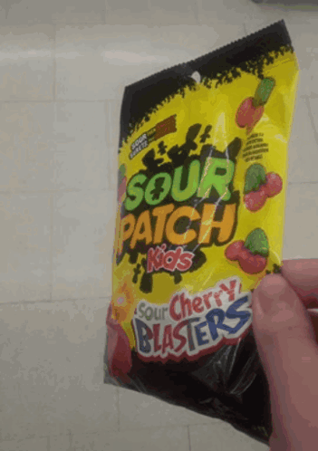 Person Holding A Bag Of Sour Patch Kids Sour Cherry Blasters GIF
