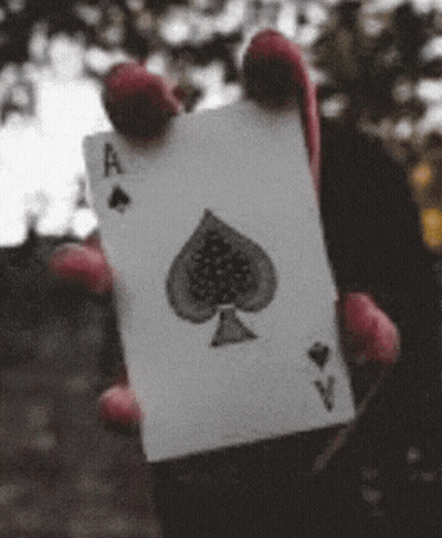 Person Holding Ace Of Spades GIF