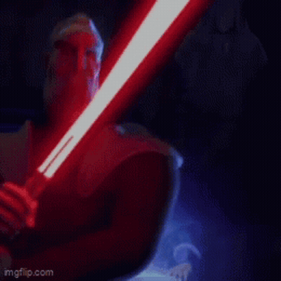 Person Holding And Lighting Up Light Saber GIF