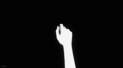 Person Holding Another Person's Hand in Black and White