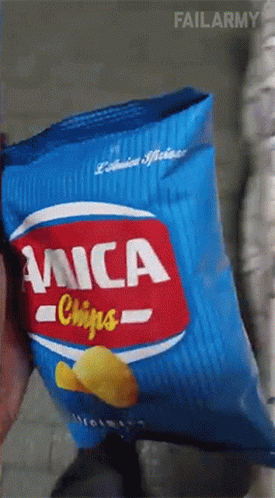 Person Holding Bag Of Mica Chips GIF