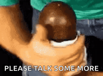 Person Holding Ball Saying Please Talk Some More GIF