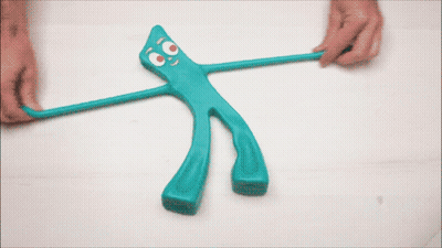 Person Holding Blue Googly-Eyed Object GIF