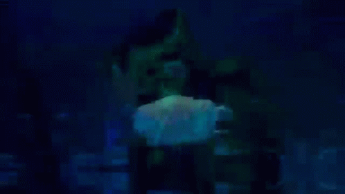 Person Holding Blue Umbrella In Rain GIF