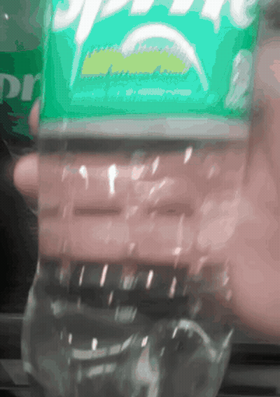 Person Holding Bottle Of Sprite GIF