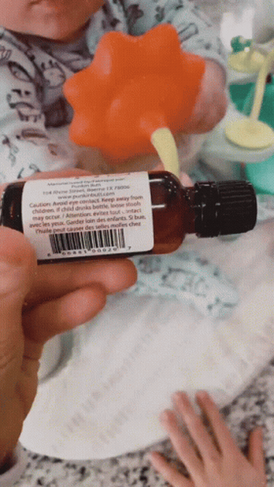 Person Holding Bottle Saying Caution GIF