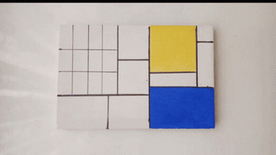 Person Holding Brush Over Painting GIF