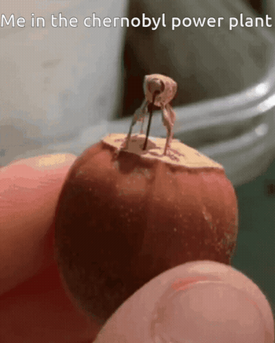 Person Holding Bug On Apple Saying Me In The Chernobyl Power Plant GIF