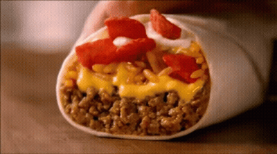Person Holding Burrito With Cheese, Meat, Rice, Tomatoes GIF
