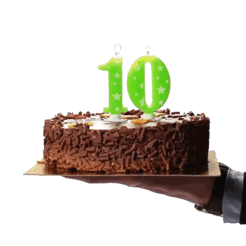 Person Holding Cake With Green Number Ten Candles Sticker